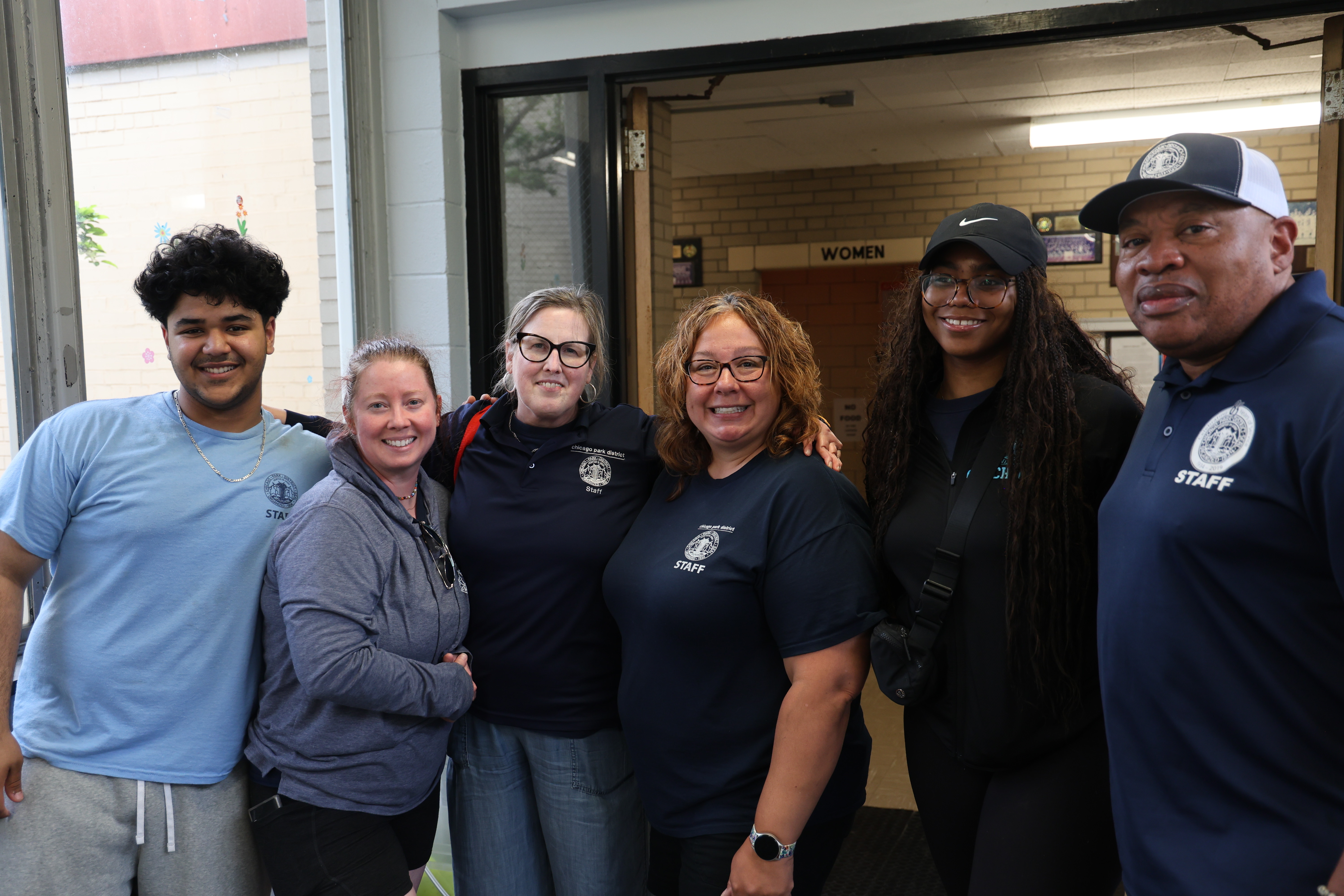 Six Chicago Park District staff members pose for a photo.
